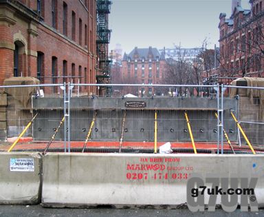 The 130-year-old cast-iron bridge on Canal Street has been replaced by a concrete one