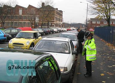 Police issuing parking tickets