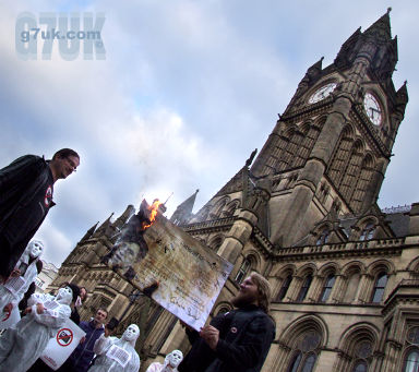 NO2ID campaigners burnt a giant ID card in front of Manchester town hall
