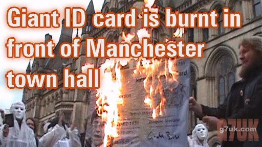 A giant ID card burnt in front of Manchester Town Hall